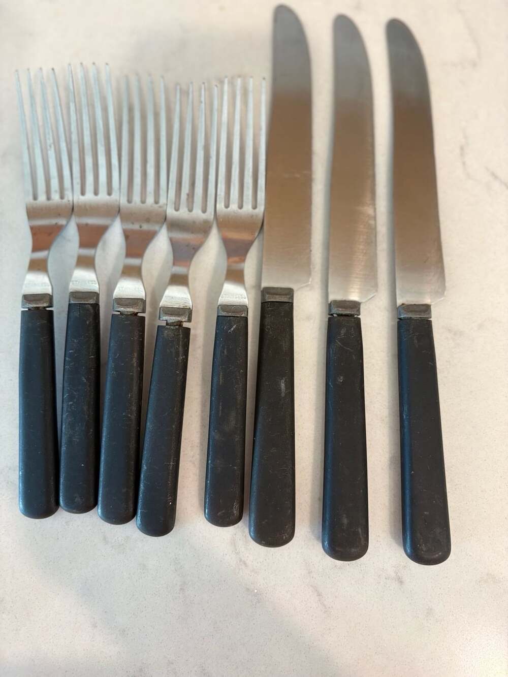 Russell Stainless Flatware Set 8 Pieces Forks and Knives Black Handles Vintage